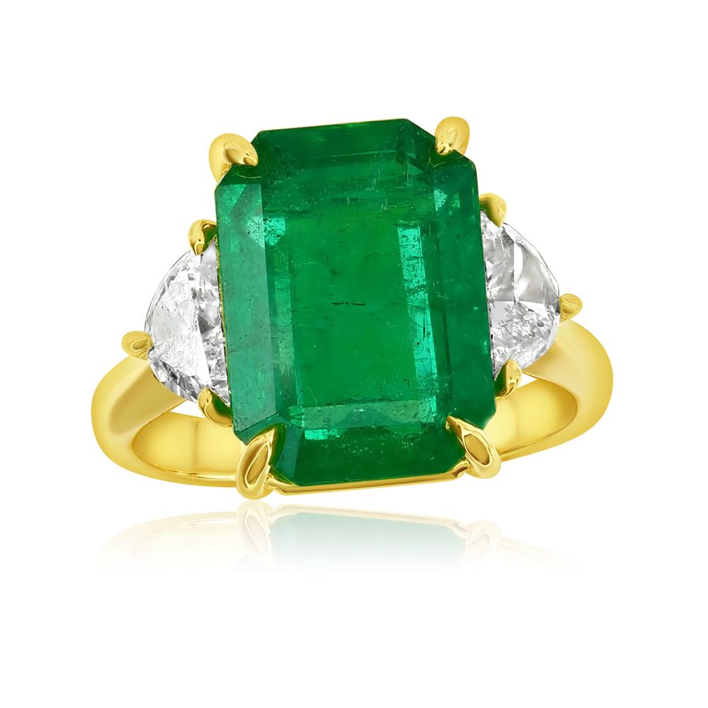 6.24 Emerald Ring with Half moon stones 